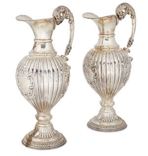 
	
		A pair of modern Spanish silver wine ewers, with lobed body and vacant cartouches, 33.5cm...