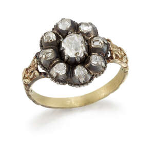 
	
		A 19th century rose-cut diamond cluster ring, in closed setting, mounted in silver and...