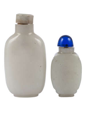 
	
		Two Chinese celadon jade snuff bottles, 19th century, of ovoid form, one with straight...