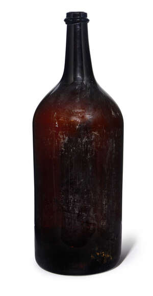 
	
		A French brown glass Balthazar Champagne bottle, 19th century, 58.5cm high
		Provenance:...