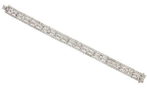 
	
		A diamond bracelet, composed of circular-cut diamond triple-row articulated panels each...