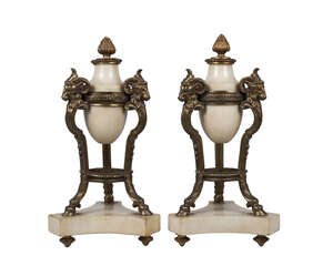 
	
		A pair of French white marble and gilt bronze urns, in the Louis XVI taste, late...