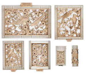 Paris, a five piece silver, silver gilt and gem set vanity set and a matched card case
c.1940,...