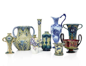 
	
		William Moorcroft (1872-1945), a Peacock Feather pattern twin-handled ceramic vase...