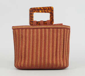 
	
		An Yves Saint Laurent two tone bronze embroidered bucket form handbag, internal pocket...