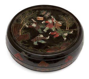 
	
		A Chinese black lacquer circular box and cover, early 20th century, painted to the cover...