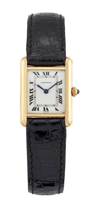 
	
		An 18ct gold 'Tank' quartz wristwatch by Cartier, the rectangular white dial with Roman...