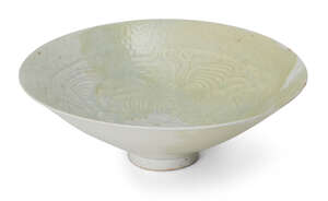 
	
		A Chinese Qingbai conical 'boys' bowl, Song dynasty, carved to the interior with two boys...