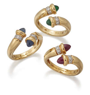 
	
		Garrard & Co, three gem-set and diamond rings, each of open work crossover design set...