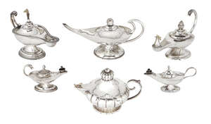 
	
		Six various silver and white metal 'Aladdin's Lamp' cigarette lighters, comprising one...
