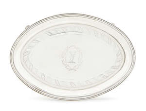 A George III silver teapot stand, London c.1799, John Emes, of naiveté form with engraved scrolling foliate band and central wreath cartouche enclosing a stag