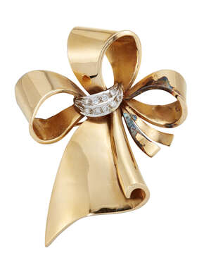 A Retro gold and diamond brooch, modelled as a ribbon bow with brilliant-cut diamond tie, c....