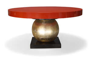 
	
		A modern circular dining table, late 20th century, with red lacquered top on gilt...