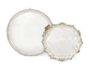 A Victorian silver salver, London, c.1864, Alexander Macrae, together with a silver card tray, Sheffield, c.1923, James Dixon & Sons, the salver raised on thre
