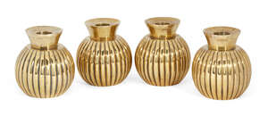 
	
		A set of four Egyptian 800 silver gilt candlestick holders, c.1943, of globular vase...