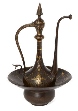 
	
		A Qajar damascened and engraved ewer and basin, Iran, 19th century, the ewer on a...