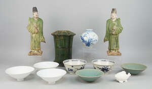 
	
		A pair of Ming style green glazed pottery figures of attendants, 20th century, 34cm high,...