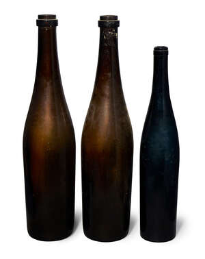
	
		A pair of German brown glass Hock bottles, late 19th/20th century, 50cm high, moulded...