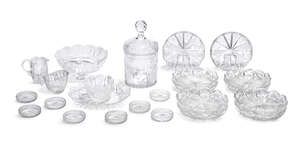 
	
		A set of ten circular cut glass dishes, late 19th century, with cut petal form rims, the...