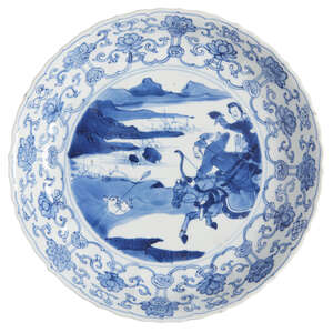 
	
		A Chinese porcelain foliate dish, Kangxi, painted in underglaze blue with a hunting scene...
