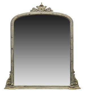 
	
		A large Victorian silvered over mantle mirror, of rectangular form, with rounded upper...