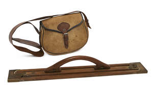 
	
		A wood and brass bound game rack, early 20th century, 62cm wide, together with a leather...
