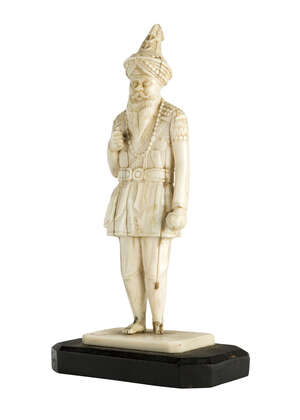 
	
		An ivory figure of a Sikh soldier, India, 19th century, on a rectangular ivory base,...
