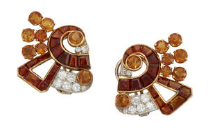 
	
		A pair of citrine and diamond earclips, of scroll and fan design set with vari-coloured...