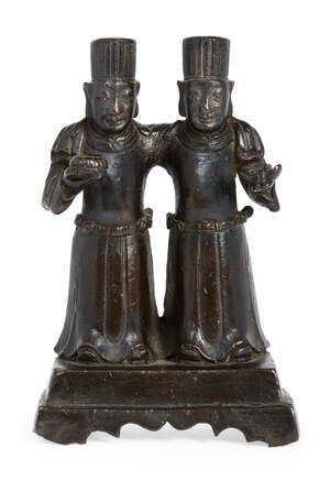 
	
		A Chinese bronze figure group, Ming dynasty, depicting two attendants standing side by...