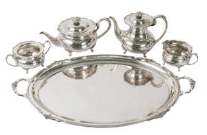A Georgian style modern silver four-part tea set, London c.1961, Cooper Brothers & Sons Ltd., comprising teapot, coffee pot, milk jug and sugar basin, with mat