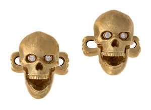 
	
		A pair of 18ct gold diamond skull cufflinks, by Ralph Lauren,  each modelled as a skull...