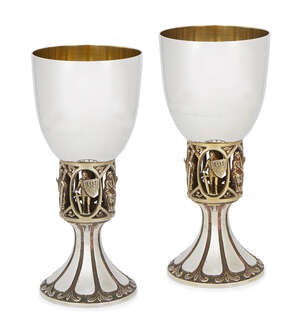 Two limited edition commemorative silver chalices, London, c.1989, Hector Miller, of circular, tapering form, the stems pierced with religious figures to a spr