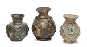 
	
		Three post-Roman squat globular form glass jars, Eastern Mediterranean, 6th-7th century, 