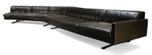 
	
		Jean-Marie Massaud (French B.1966), a black leather 'Kennedee' modular sofa for Poltrona...
