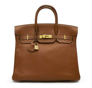 
	
		Hermes: a gold Togo leather Haut-a-Courroies handbag, 32cm, with gilt metal hardware,...