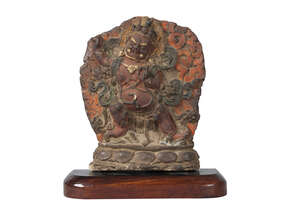 
	
		A Tibetan painted terracotta votive plaque, 17th century, depicting Havagriva, 20cm...