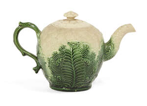 
	
		An 18th Century English creamware cauliflower moulded teapot and lid, probably Wedgwood,...