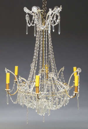 
	
		A Continental glass six light chandelier, the supporting ring with moulded plaque edge...