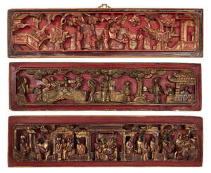 
	
		A group of three Chinese gilt and lacquer panels, late Qing period, each carved with a...