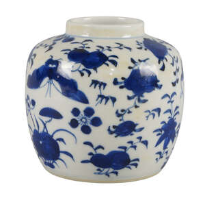 A Chinese porcelain jar, 19th century, painted in underglaze blue with birds and floral sprays, underglaze blue four character Kangxi mark to base, 10cm high