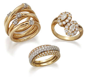 
	
		Three diamond rings, comprising: a ring of crossover design  set with two pear-shaped...