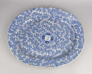 
	
		A Victorian blue and white ironstone meat plate, applied to the centre with a circular...