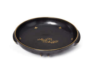 
	
		Gmundner Keramik, an Austrian black ceramic bowl
		Second quarter 20th Century, printed...