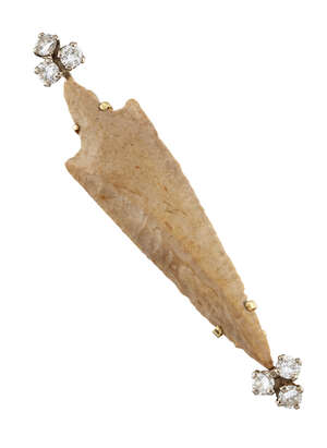 
	
		A diamond and Neolithic arrowhead limited edition brooch, by Garrard, each terminal of...