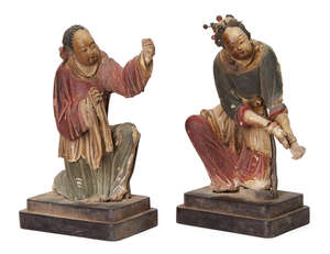 
	
		Two Chinese painted stucco figures, 17th/18th century, modelled as a man and a woman...
