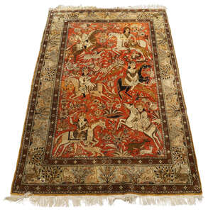 
	
		A Persian Tabriz pictorial part silk rug, early 20th century, woven with hunters on...