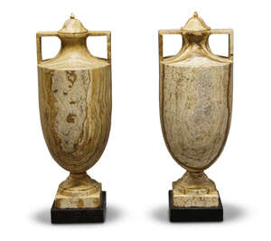 
	
		A pair of alabastro fiorentino classical vases and covers, 20th century, on black marble...