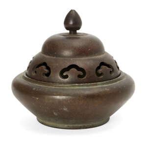 
	
		A Japanese bronze censer and cover, 19th century, decorated with cloud cuts to lid,...