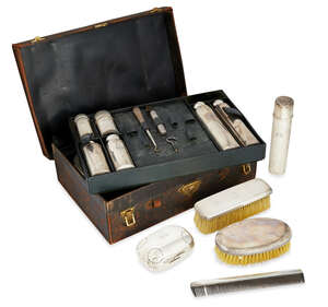 
	
		A Tiffany & Co. Sterling silver fitted dressing case, the leather case fitted with two...