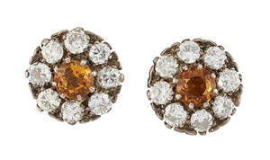 A pair of citrine and diamond cluster earrings, each designed as a claw-set citrine with circular-cut diamond border, approximate total weight of diamonds 3.20